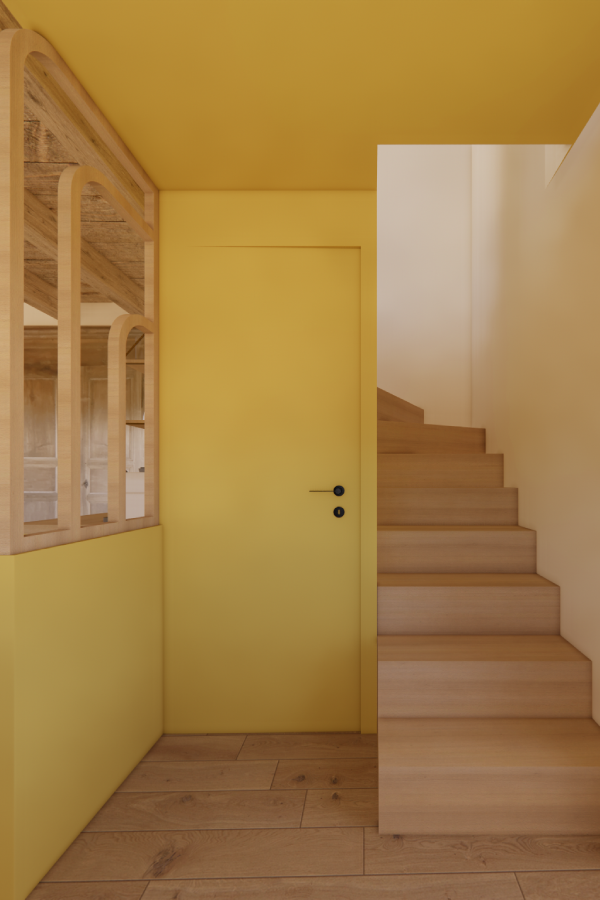 Entrée avec effet boîte de couleur jaune. Escalier et verrière aux formes arrondies en chêne naturel.
